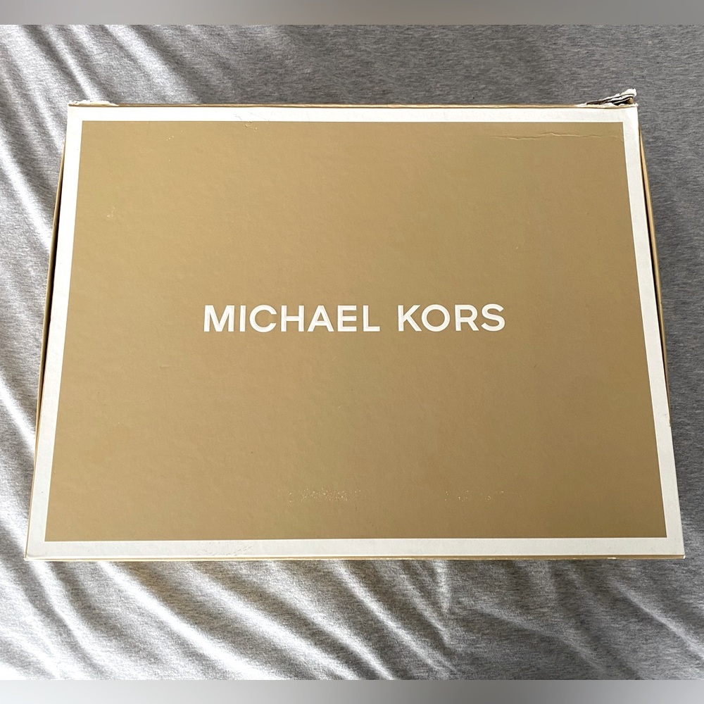 Michael Kors Bag with 3 closures, two open and one zip.